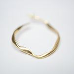 E71032 Boucles d'oreilles Créole irrégulière - Karine Sultan - Vignette | Karine Sultan