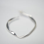 E71032 Boucles d'oreilles Créole irrégulière - Karine Sultan - Vignette | Karine Sultan