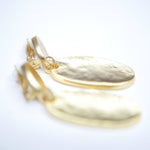 E71067 Boucles d'oreilles clips goutte ovale texturée - Karine Sultan - Vignette | Karine Sultan